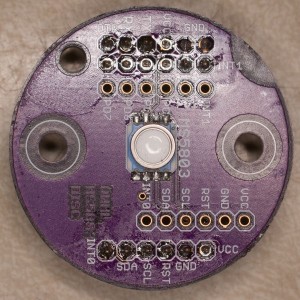 Top side of the MS5803 disc, with the MS5803-14BA soldered in the center. 