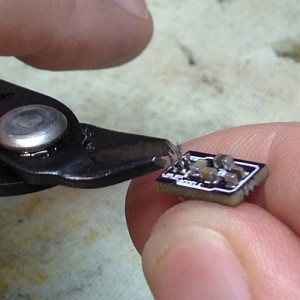 Trim off the excess, since the goal is to have as small a sensor as possible. 