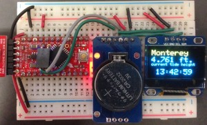 The three components of my simple tide clock from left to right: Arduino Pro Mini 3.3V (red), Real Time Clock (blue), SSD1306 OLED display.